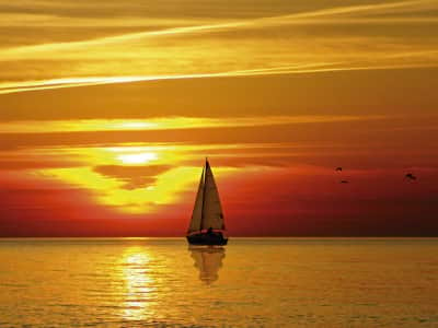 Fototapeta Jacht o zachodzie słońca