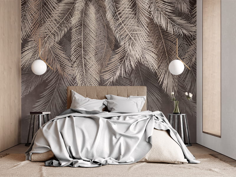 Fototapeta Zwisające liście palmowe we wnętrzu sypialni