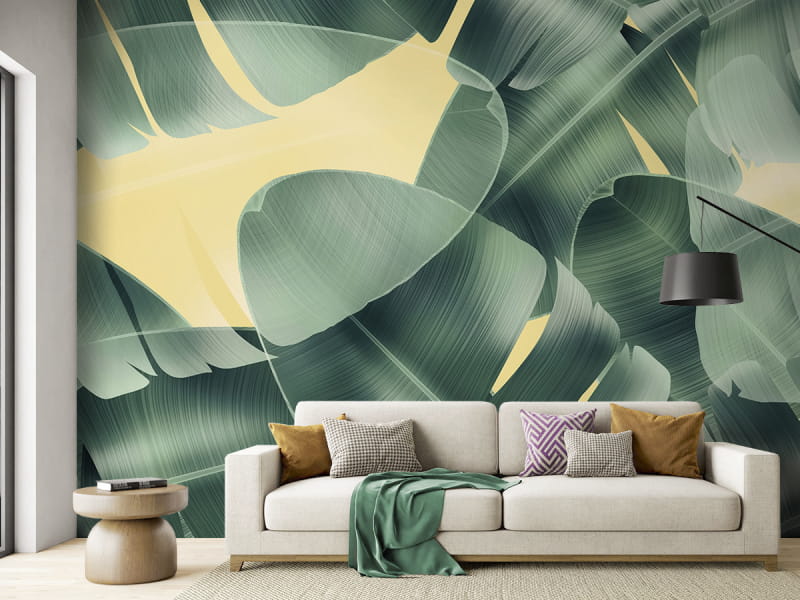 Fototapeta Liście na żółtym tle we wnętrzu salonu