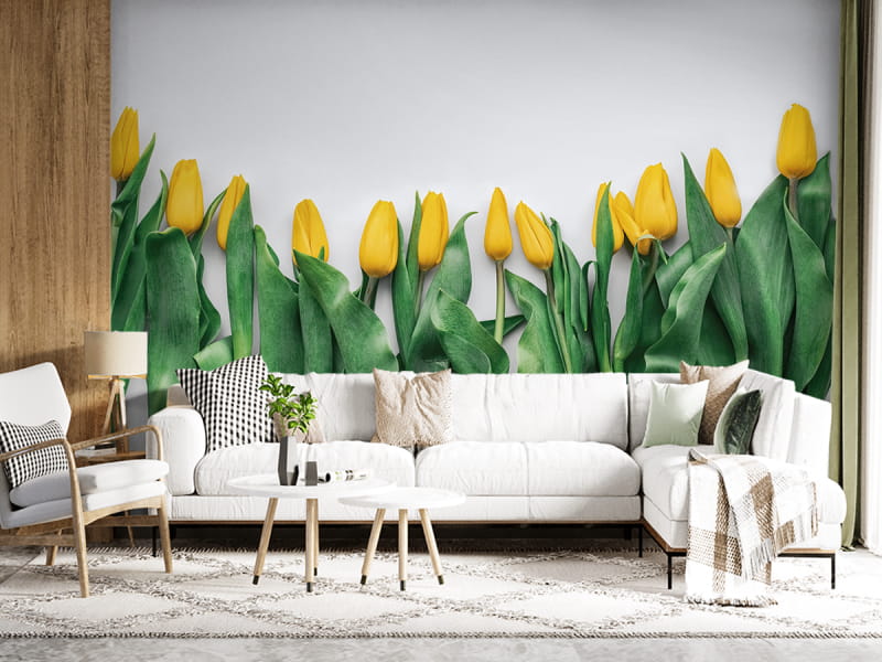 Fototapeta Delikatne żółte tulipany we wnętrzu salonu