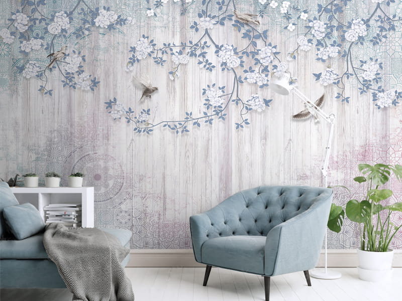 Fototapeta Gałęzie kwitnących drzew we wnętrzu salonu